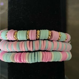 Bracelet set of three, purple and blue themed.